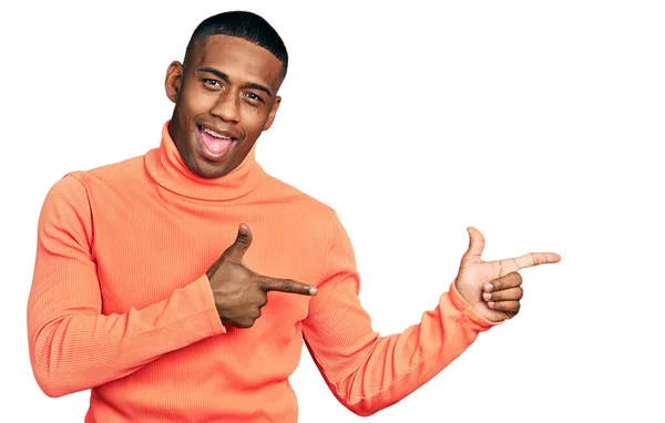 Young Black Man Wearing Orange Turtleneck Sweater Smiling Looking Camera — Stok fotoğraf