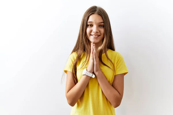 Giovane Adolescente Bruna Piedi Insieme Sfondo Isolato Pregando Con Mani — Foto Stock