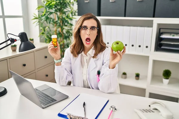 Young Woman Working Dietitian Clinic Afraid Shocked Surprise Amazed Expression — Foto Stock