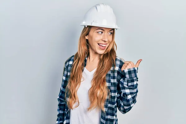 Young Caucasian Woman Wearing Architect Hardhat Smiling Happy Face Looking — Stockfoto