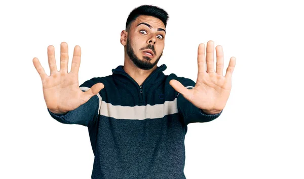 Young Hispanic Man Beard Wearing Casual Winter Sweater Afraid Terrified — Stock Photo, Image