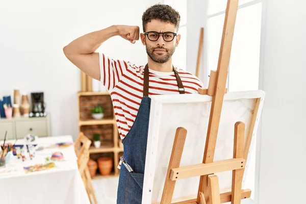 Arab Young Man Art Studio Strong Person Showing Arm Muscle — 스톡 사진
