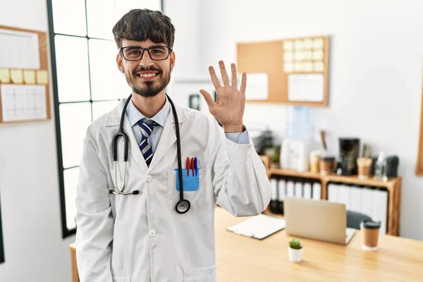 Hispanic Man Beard Wearing Doctor Uniform Stethoscope Office Showing Pointing — Stock Photo, Image
