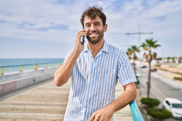 Young Hispanic Man Smiling Happy Talking Smartphone Promenade — Stock Photo, Image