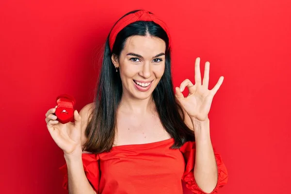 Young Brunette Woman Holding Engagement Ring Proposal Doing Sign Fingers — 스톡 사진