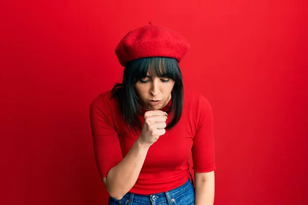 Young Hispanic Woman Wearing French Look Beret Feeling Unwell Coughing — стоковое фото