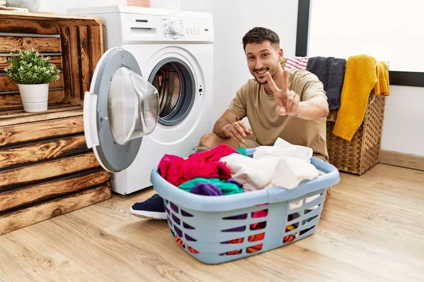 Young Handsome Man Putting Dirty Laundry Washing Machine Smiling Looking — ストック写真