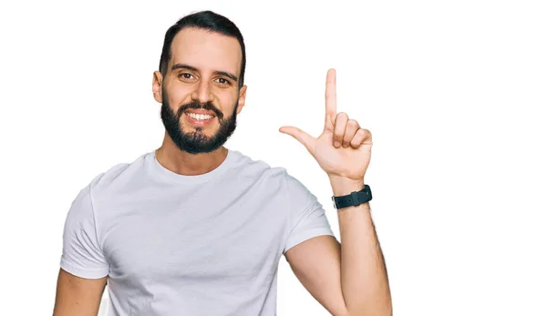 Young Man Beard Wearing Casual White Shirt Showing Pointing Fingers — Foto de Stock