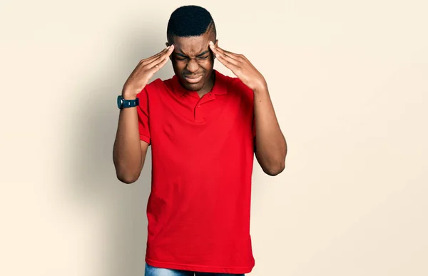 Young African American Man Wearing Casual Red Shirt Hand Head — 스톡 사진