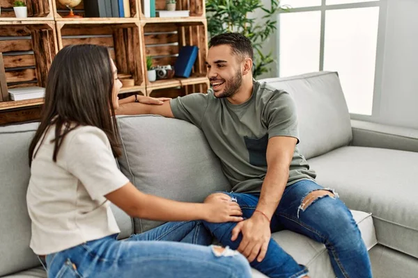 Young Latin Couple Having Conversation Sitting Sofa Home — Stock Photo, Image