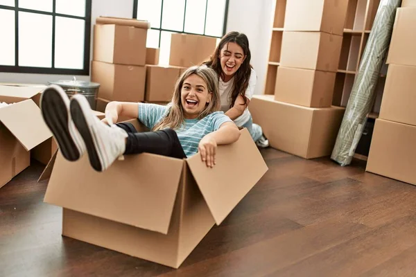 Young Couple Smiling Happy Playing Using Cardboard Box Car New — Stock Photo, Image