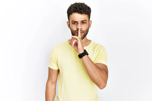 Arab Young Man Standing Isolated Background Asking Quiet Finger Lips — Stock Photo, Image