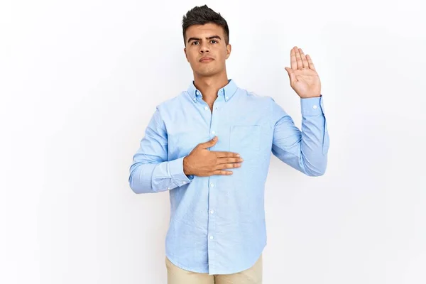 Young Hispanic Man Wearing Business Shirt Standing Isolated Background Swearing — стоковое фото