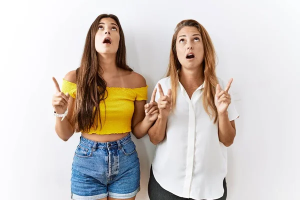 Mother Daughter Together Standing Together Isolated Background Amazed Surprised Looking — Stockfoto