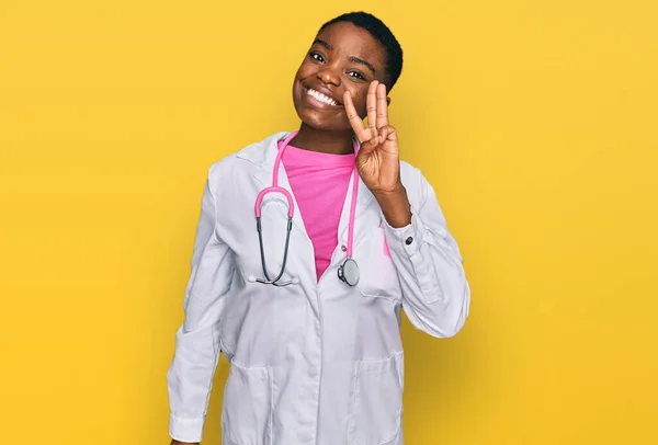 Young African American Woman Wearing Doctor Uniform Stethoscope Showing Pointing — Stock Photo, Image