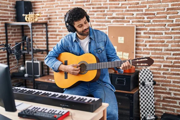 Young Arab Man Musician Playing Classical Guitar Music Studio — Fotografia de Stock