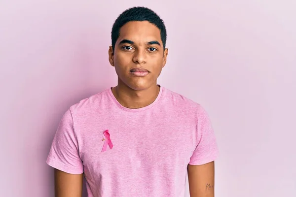 Young Handsome Hispanic Man Wearing Pink Cancer Ribbon Shirt Thinking — Stock Photo, Image