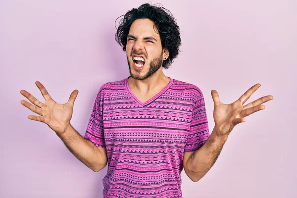 Handsome Hispanic Man Wearing Casual Pink Shirt Crazy Mad Shouting — Fotografia de Stock