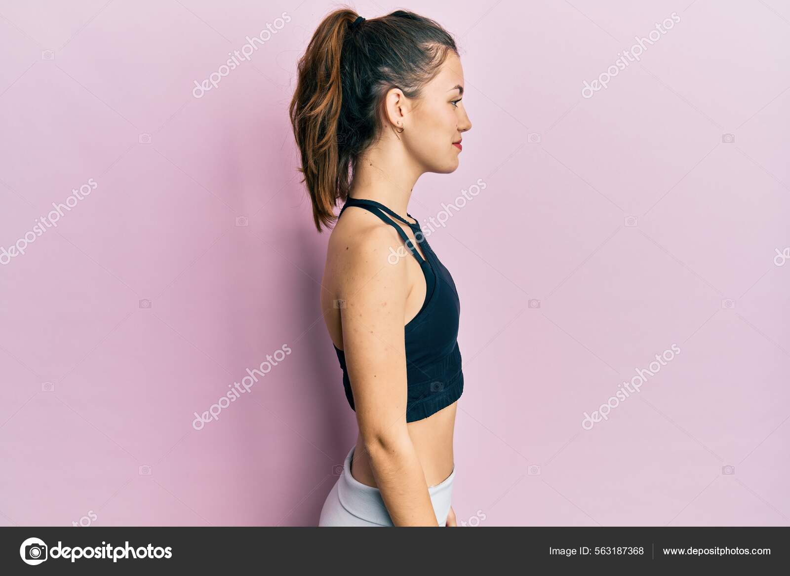 Young Brunette Woman Wearing Sportswear Looking Side Relax Profile.