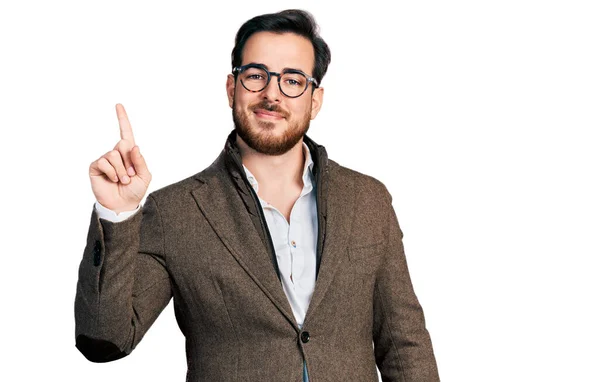 Young Hispanic Man Wearing Business Jacket Glasses Showing Pointing Finger — Foto Stock