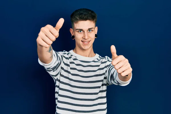 Young Caucasian Boy Ears Dilation Wearing Casual Striped Shirt Approving — Stock Fotó