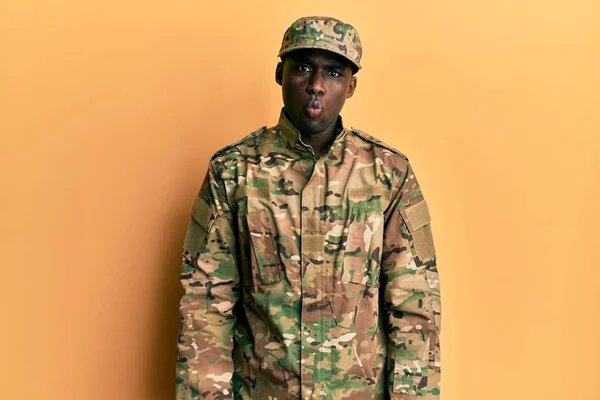 Young African American Man Wearing Army Uniform Puffing Cheeks Funny — Photo