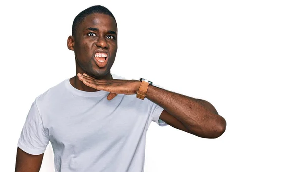 Young African American Man Wearing Casual White Shirt Cutting Throat — Φωτογραφία Αρχείου