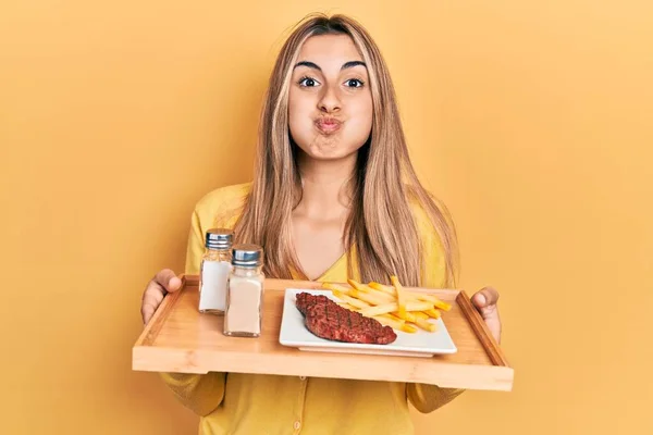 Beautiful Hispanic Woman Holding Tray Lunch Puffing Cheeks Funny Face — Stock Fotó