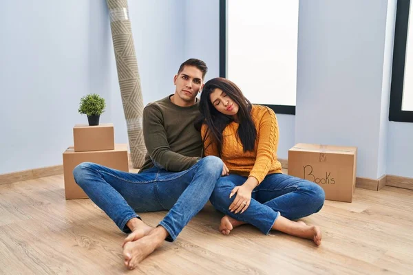 Young Couple Sitting Floor New Home Looking Sleepy Tired Exhausted — Stockfoto