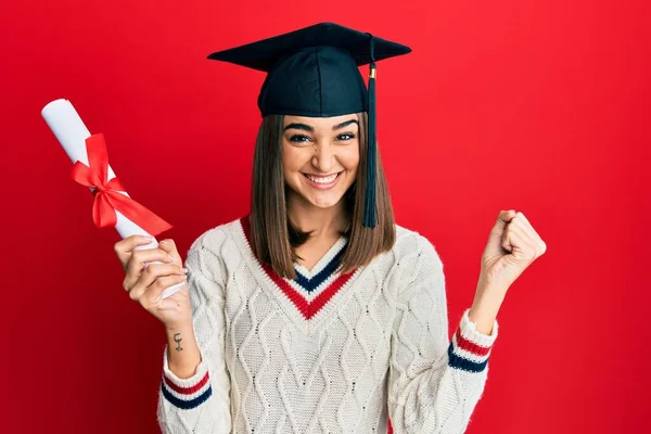 Young Brunette Girl Holding Graduate Degree Diploma Screaming Proud Celebrating — Stock Fotó