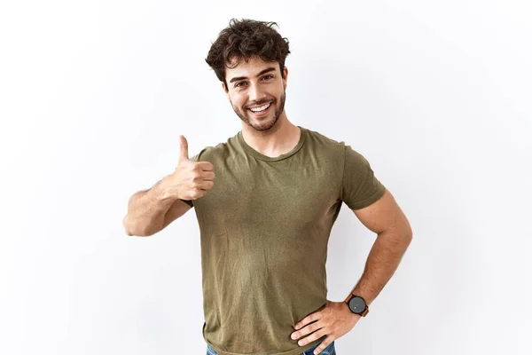 Hispanic Man Standing Isolated White Background Doing Happy Thumbs Gesture — 图库照片