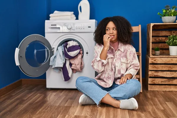 Young African American Woman Sitting Floor Doing Laundry Looking Stressed — Fotografia de Stock