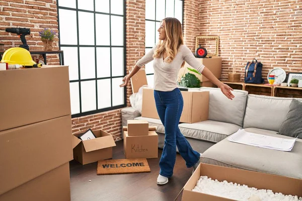 Young Blonde Woman Smiling Confident Standing Open Arms New Home — Foto Stock