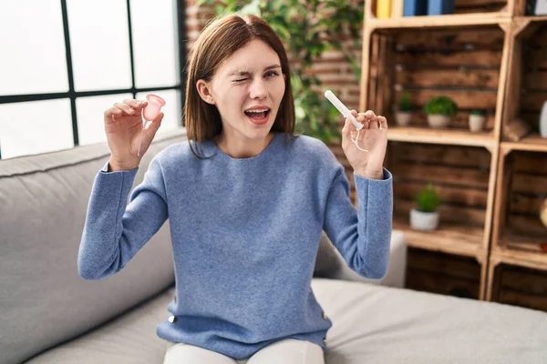 Young Brunette Woman Holding Menstrual Cup Tampon Winking Looking Camera — Stock Photo, Image