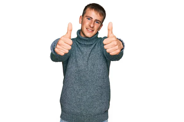 Young Blond Man Wearing Casual Clothes Approving Doing Positive Gesture — Foto Stock