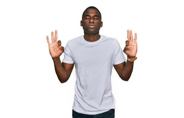 Young African American Man Wearing Casual White Shirt Relaxed Smiling — 스톡 사진