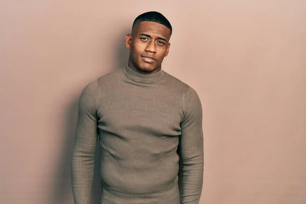 Young Black Man Wearing Casual Turtleneck Sweater Relaxed Serious Expression — Fotografia de Stock
