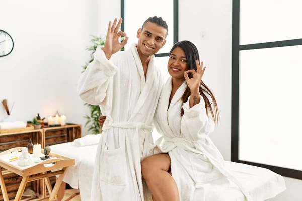 Young Latin Couple Wearing Towel Standing Beauty Center Smiling Positive — Stockfoto