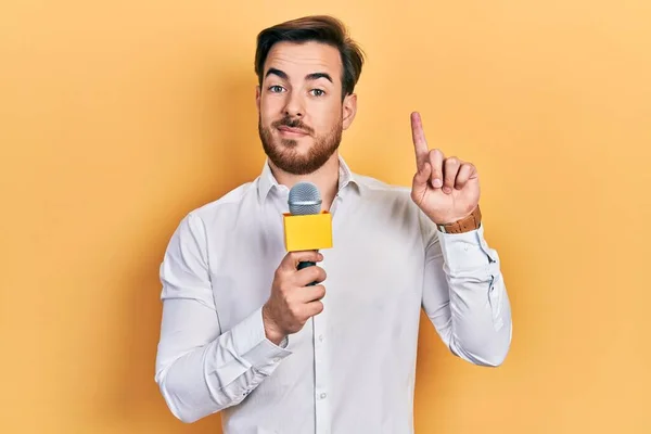 Handsome Caucasian Man Beard Holding Reporter Microphone Surprised Idea Question — Stok fotoğraf