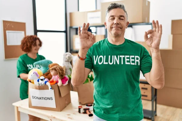 Middle Age Man Wearing Volunteer Shirt Donations Stand Relax Smiling — Stock Photo, Image