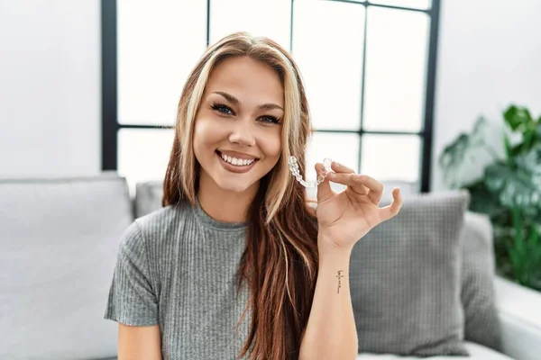 Young Caucasian Woman Holding Invisible Aligner Orthodontic Looking Positive Happy — Stock Photo, Image