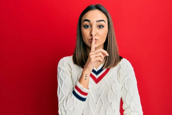 Young Brunette Girl Wearing Casual Student Sweater Asking Quiet Finger — Stock Fotó