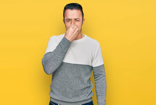 Handsome Young Man Wearing Casual Winter Sweater Smelling Something Stinky — Photo