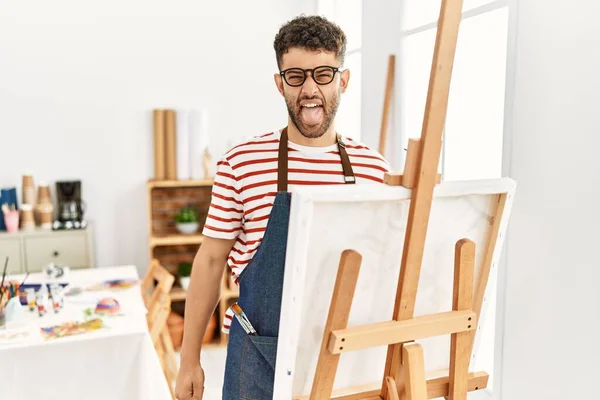 Arab Young Man Art Studio Sticking Tongue Out Happy Funny — Stok fotoğraf
