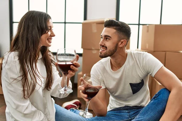 Young Hispanic Couple Smiling Happy Toasting Red Wine New Home — Stock Photo, Image