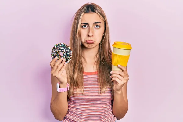 Beautiful Hispanic Woman Eating Doughnut Drinking Coffee Depressed Worry Distress — Stock Photo, Image