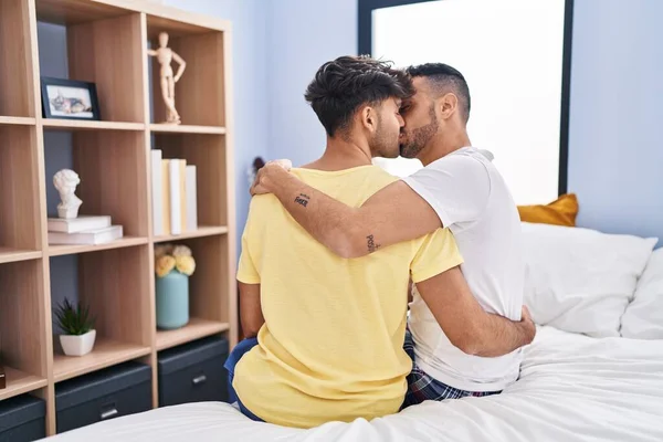 Two Man Couple Hugging Each Other Kissing Sitting Bed Bedroom — стоковое фото