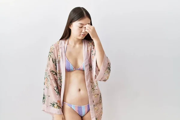 Young Asian Woman Wearing Bikini Floral Kimono Tired Rubbing Nose — стоковое фото