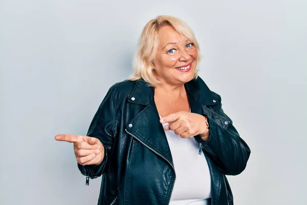 Middle Age Blonde Woman Wearing Leather Jacket Pointing Fingers Camera — Stock Photo, Image
