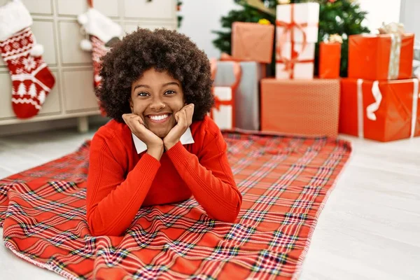 Young African American Woman Smiling Confident Lying Christmas Tree Home — Foto de Stock